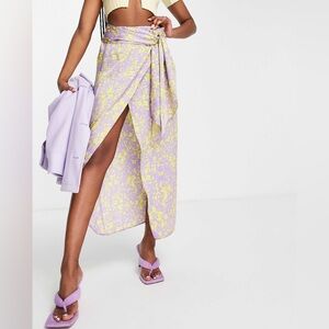 ASOS DESIGN satin wrap midi skirt in lilac with yellow floral
